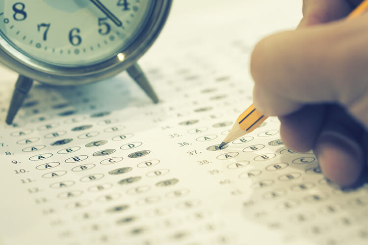 exam with clock in the background exam with clock in the background